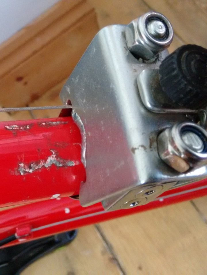 Damage to the down tube from where the down tube bracket has become loose