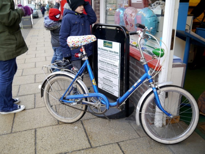 Puch shopper outside a post office