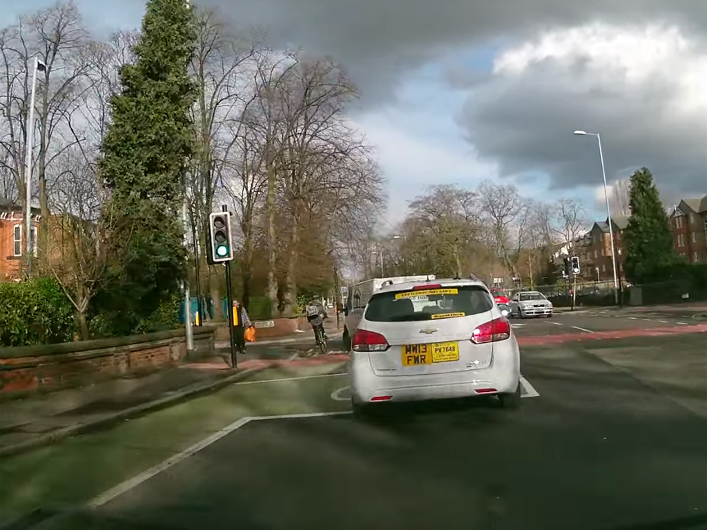Still from Van and Cyclist Crash video by That'snotmy Name