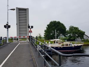 Watching boats pass at one of the lifting bridges on the Vliet canal