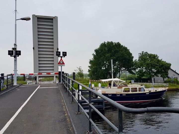 Watching boats pass at one of the lifting bridges on the Vliet canal