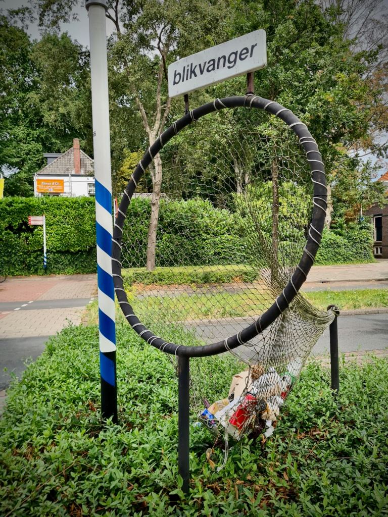 "Blikvanger" or "can catcher", handy bin to throw your rubbish in as you cycle past