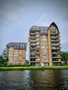 Some very Dutch looking apartments, with unusual mansard roofs