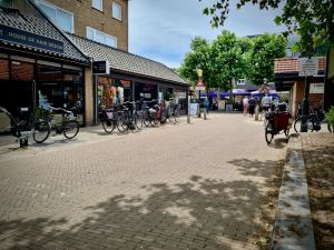 View from the square to the main shopping street, more on-street cycle parking