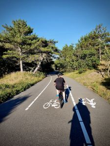 Our youngest riding along the dune route