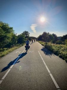 Riding along the dune route, with the sun behind us