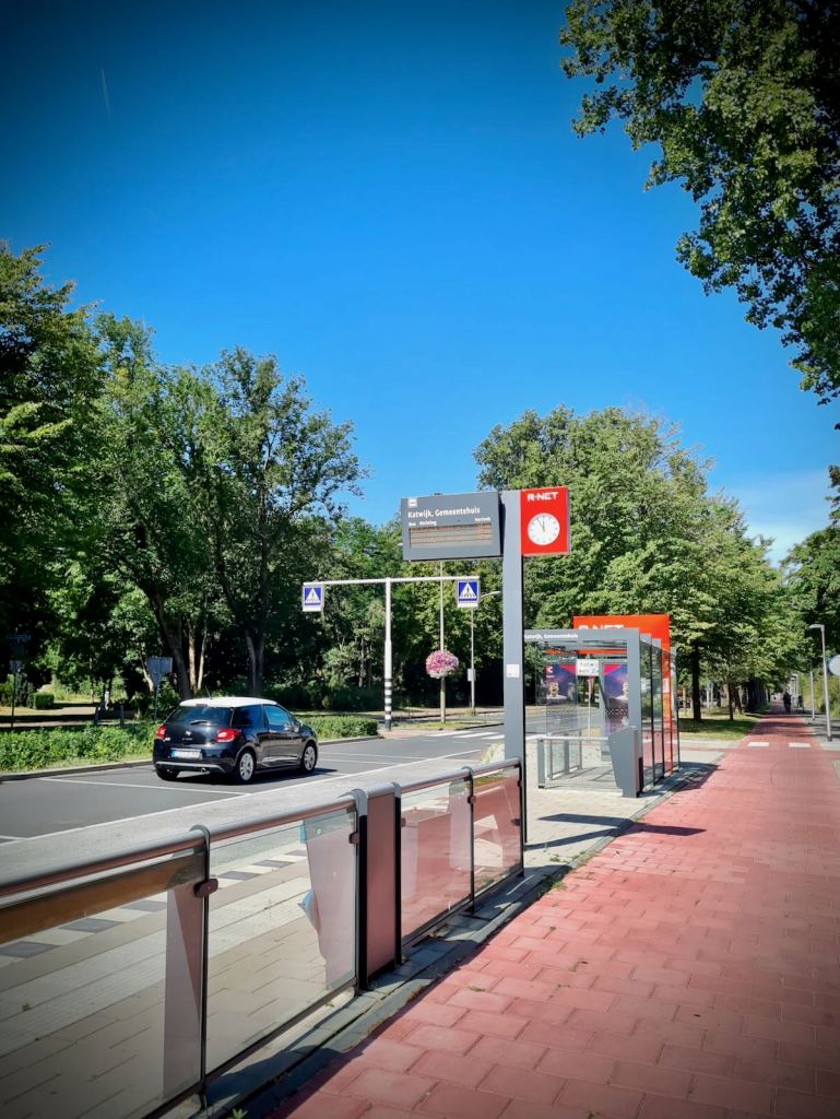 Bus stop bypass, looking much wider and straighter, compared to the British equivalent