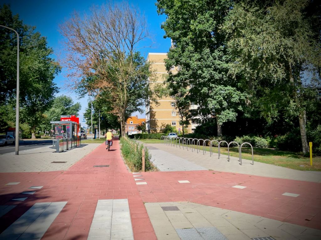 Another bus stop bypass, with lots of cycle parking