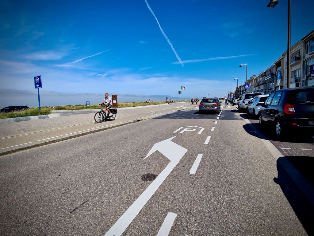 Riding along Boulevard, next to the beach, not great with the door-zone cycle lane