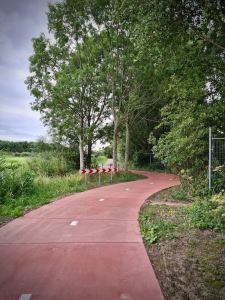 Recently installed coloured concrete surface, was previously asphalt