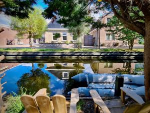 View of the canal and street opposite, from our garden