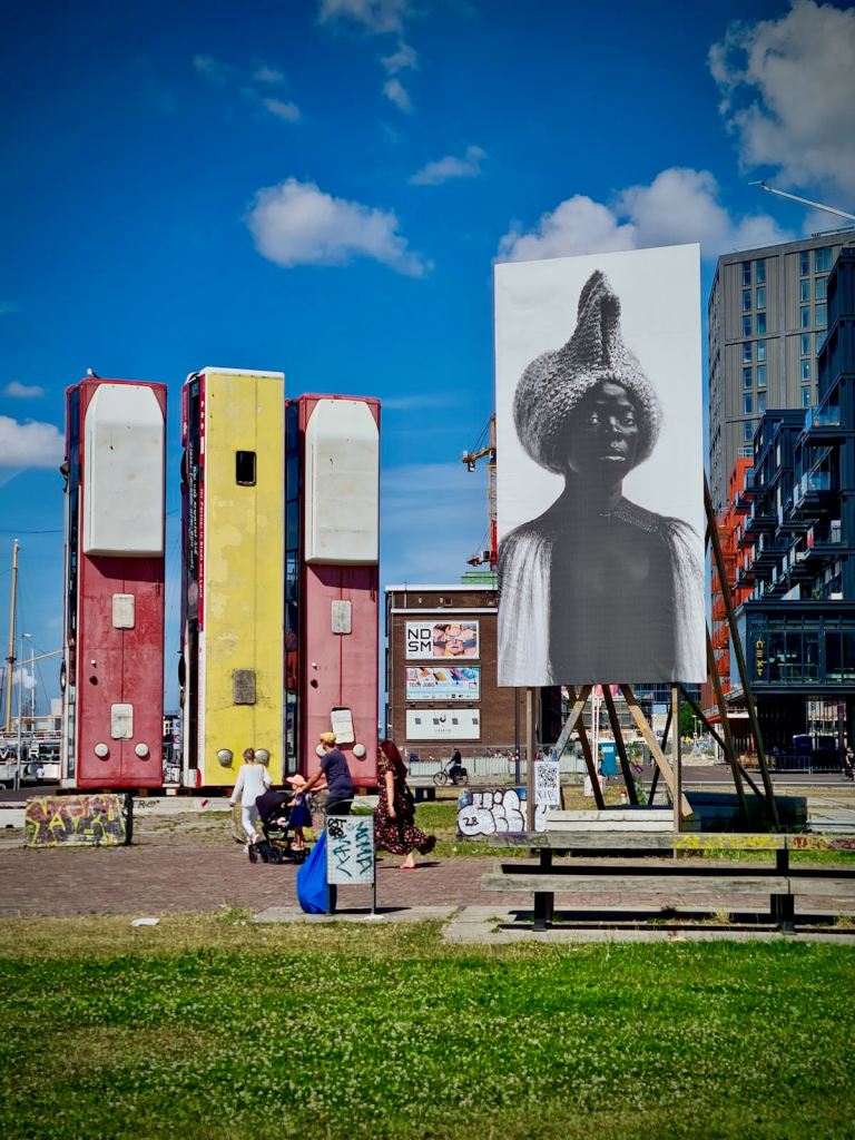 Monument artwork by Manaf Halbouni and self portrait by Zanele Muholi