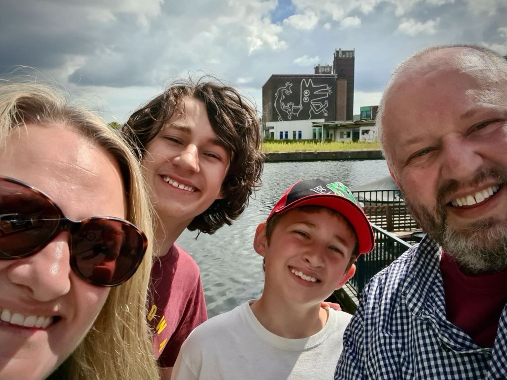 Us posing in front the Keith Haring mural at Markt Centraal