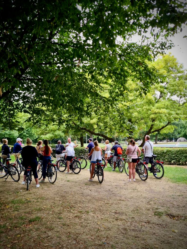 People on a cycle tour in Vondelpark