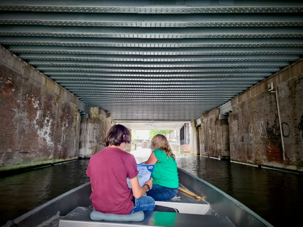 Passing under the railway lines heading to Amsterdam Centraal