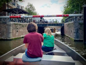 Passing under a bridge on Herengracht