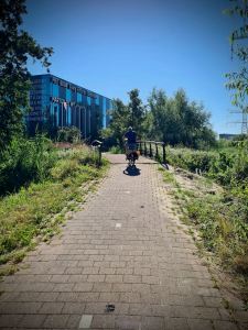 Bridge over some water, after passing under the A8 motorway
