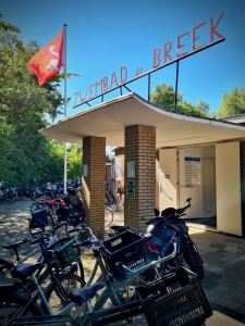 Lots of bikes parked up at Zwembad De Breek entrance