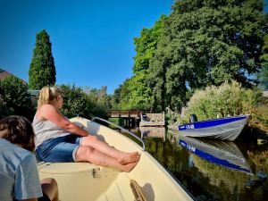 Passing a moored up boat