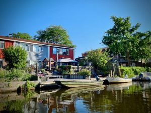 Boats moored up to houses