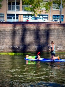 Paddleboarding with child