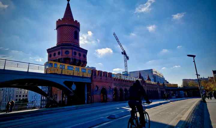 Cycle and U-Bahn train on the Oberbaumbrücke bridge