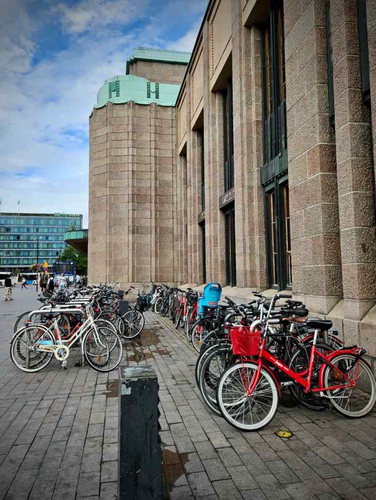 Lots of practical bikes parked outside Helsinki Central Station