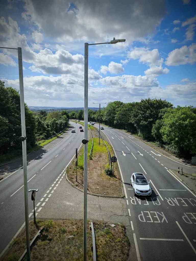 View of A249 Sittingbourne Road from Jade's Crossing