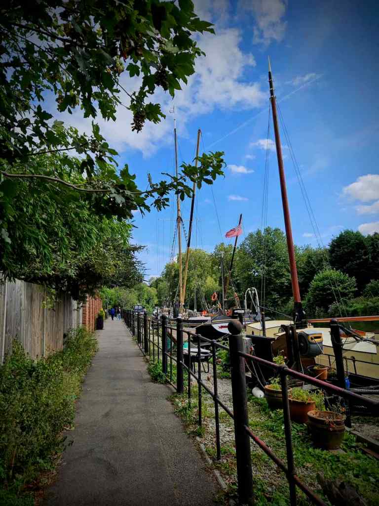 Passing houseboats on the Medway