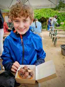 Youngest about to tuck into a doughnut