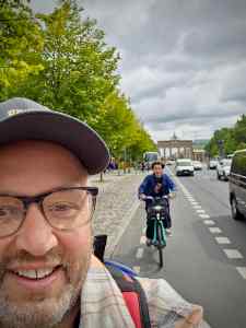 Selfie on Straße des 17. Juni, Brandenburg Gate in the background