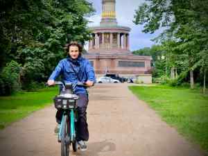 Riding in the In the Tiergarten, Siegessäule (Victory Column) in the background