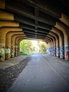 Passing under a bridge, on what would have been the old railway line