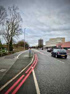 Before Newton Street, footway level cycle path to be replaced with carriageway level cycle lane
