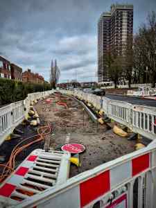 Construction of new cycleway, which will bypass parking bay and pedestrian crossing