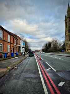 Towards Derbyshire Lane, car blocking the cycle lane