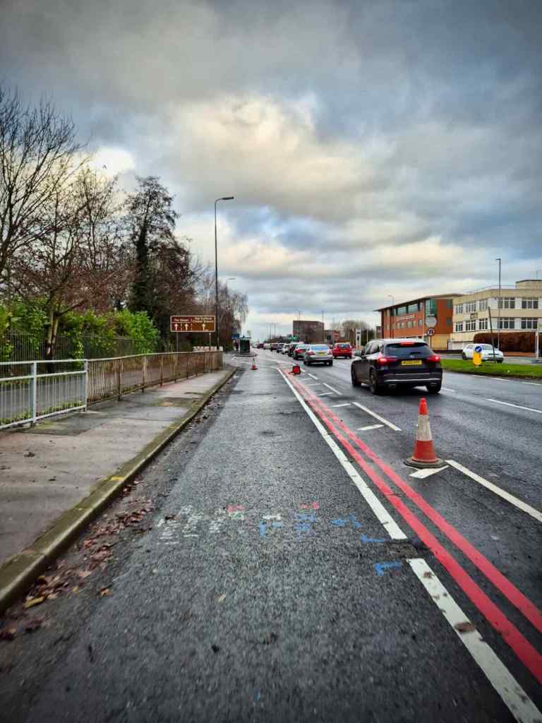 Approaching Davyhulme Road East, guardrails are being kept here
