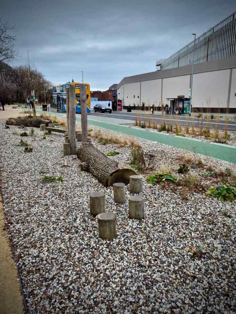 One of the many new green spaces, with a little play area for kids