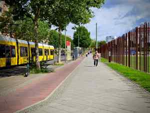 Berlin Wall on Bernauer Straße, with cycle path and tram