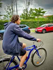 Our eldest riding on In den Ministergärten