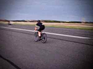 Person cycling on the runway at Tempelhofer Feld
