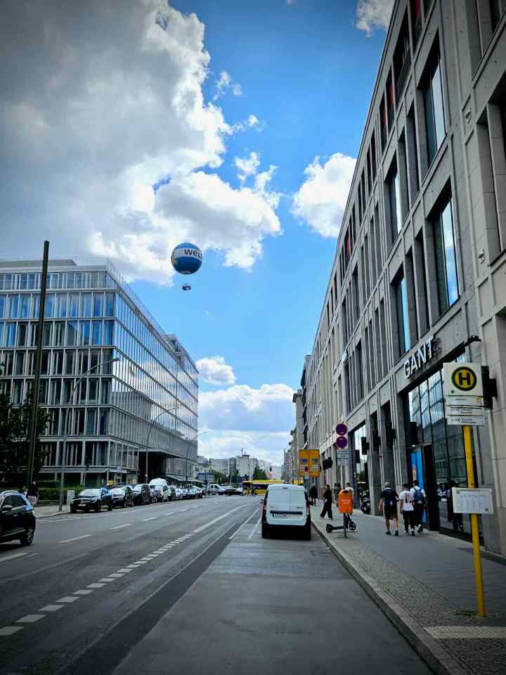 Door zone cycle lane of sort on Wilhelmstrasse, Weltballon in the sky