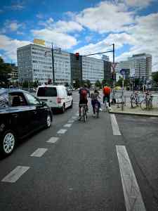 At the traffic lights, in a painted lane on Memhardstraße