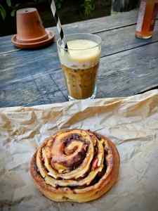 Enjoying a pastry and a coffee