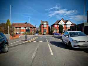 Approaching the A6 Wellington Road North