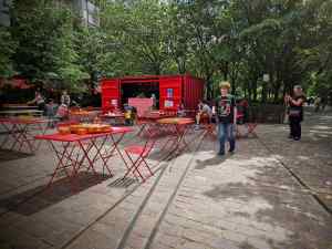 Tables set out with board games in Parc Clichy-Batignolles – Martin Luther King