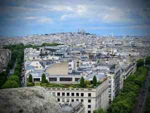 Looking north east from the Arc de Triomphe, Basilique du Sacré-Cœur de Montmartre in the distance