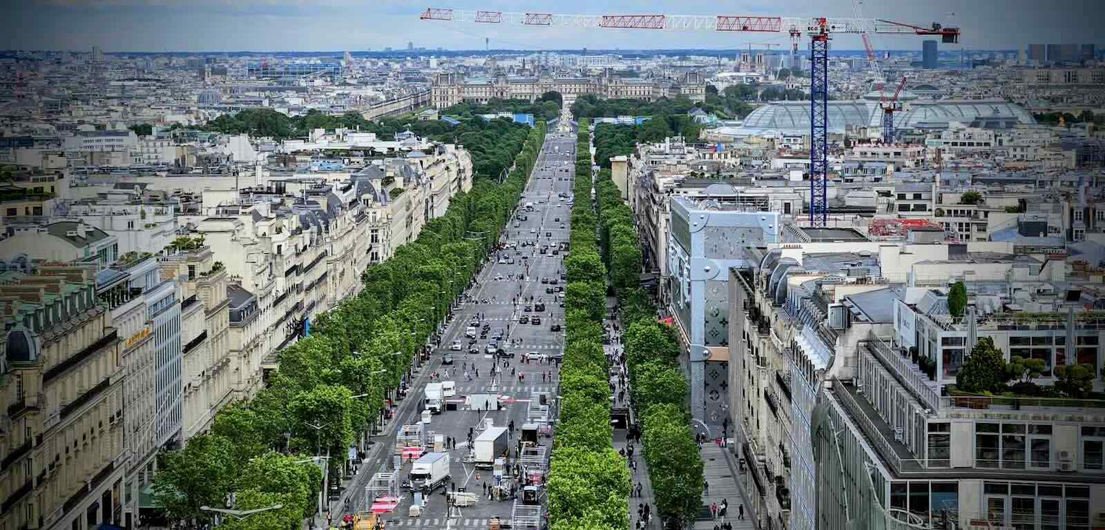 Looking south east from the Arc de Triomphe, along Avenue des Champs-Élysées, Musée du Louvre in the distance