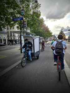 Cargo bike coming the other way on Quai Voltaire