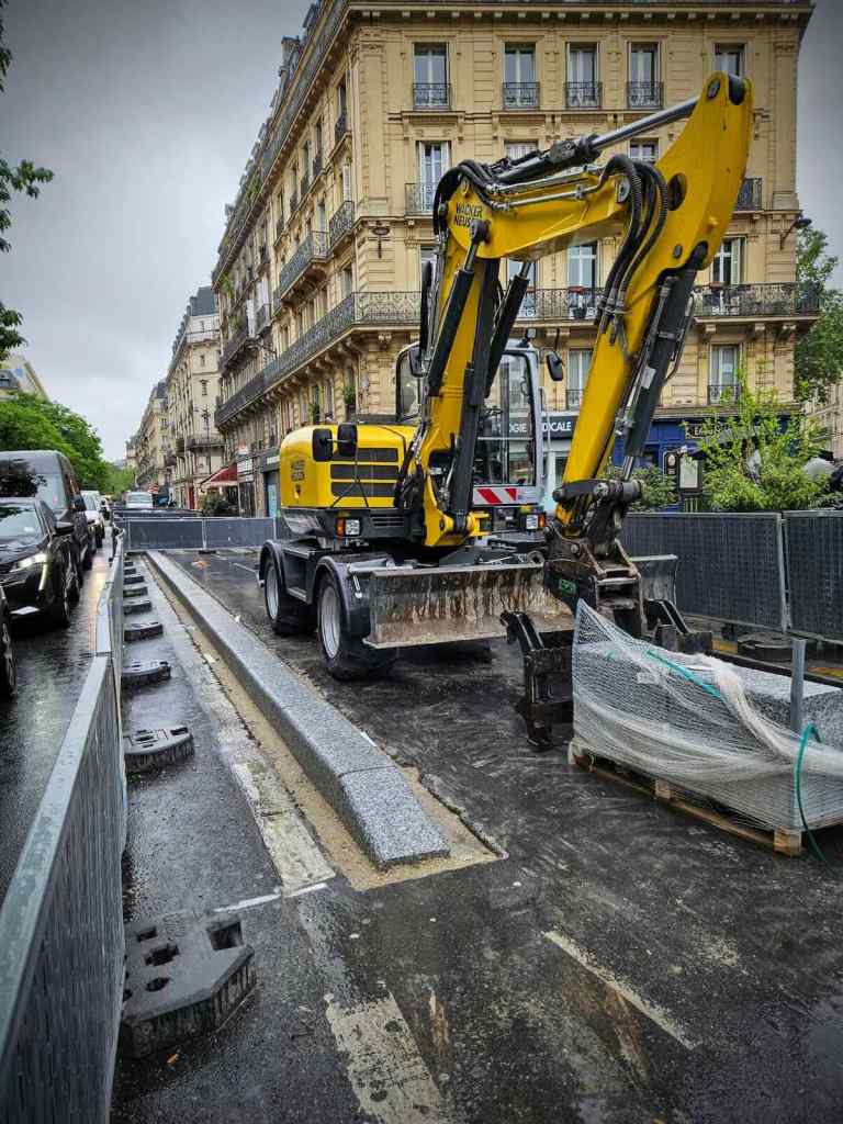 New kerb protected cycle lane being installed on Rue de Turbigo